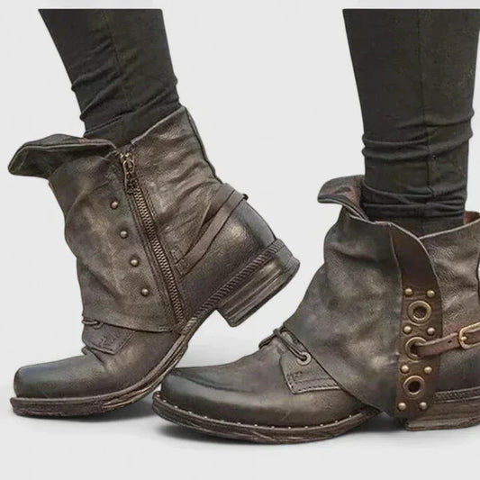 Women's faux leather side zip ankle boots with buckle strap