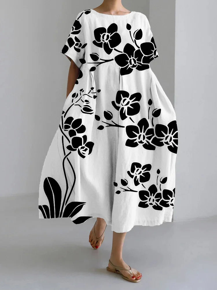 Women's floral A-line midi dress with boat-neck and loose short-sleeve design – White