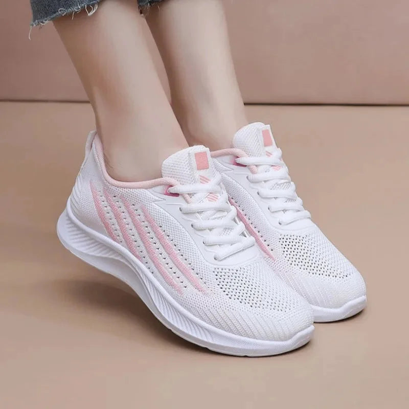 Women's knit athletic running sneakers with lace-up striped design