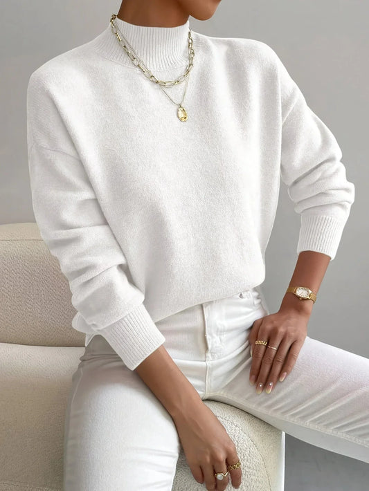 Women's mock-neck long-sleeve knit sweater with relaxed fit and ribbed cuffs – White