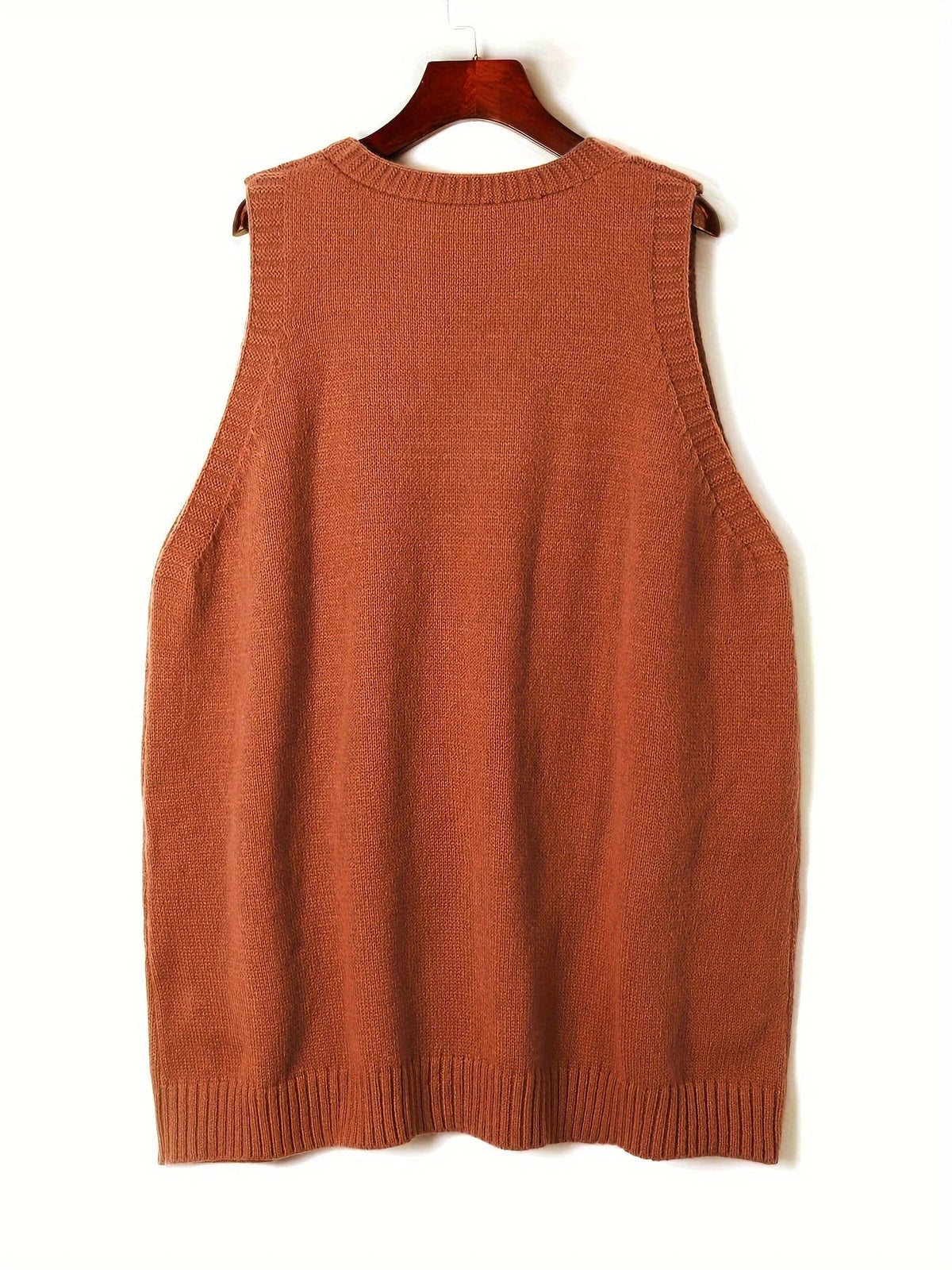 Women's oversized knit vest with V-neck sleeveless tunic length and patch pockets