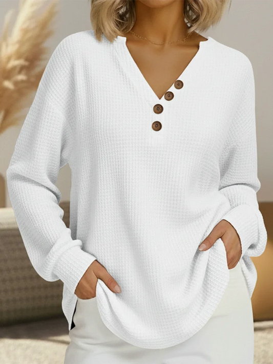 Women's relaxed long sleeve waffle knit sweater with button V-neck – White