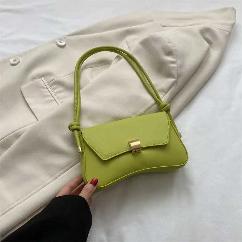 Women's solid color faux leather shoulder bag with flap closure and knotted strap – Green