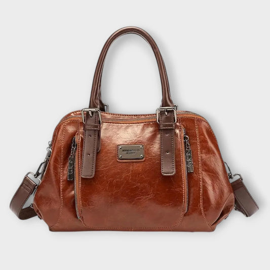 Women's structured faux leather handbag with top handles and zip pockets