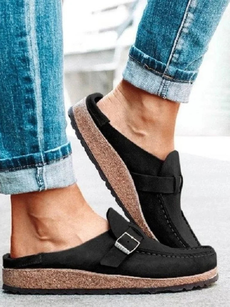 Women's suede comfort clogs with buckled strap and contrast stitching