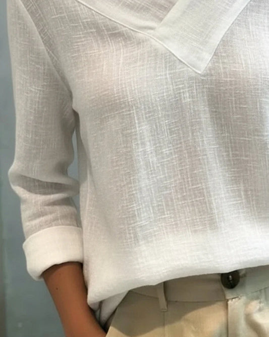 Women's textured long-sleeve top with asymmetric V-neck