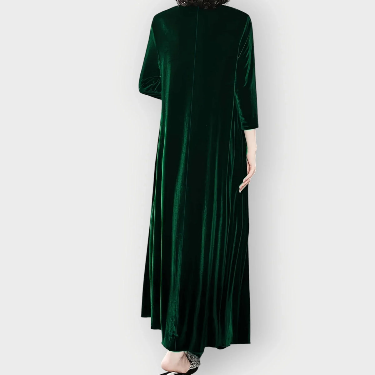 Women's velvet flowy maxi dress with long sleeves and round neck