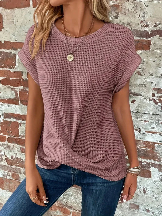 Women's waffle knit sweater with crew-neck short sleeves and front twist