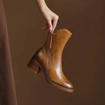Women's leather ankle boots with side zip and platform sole