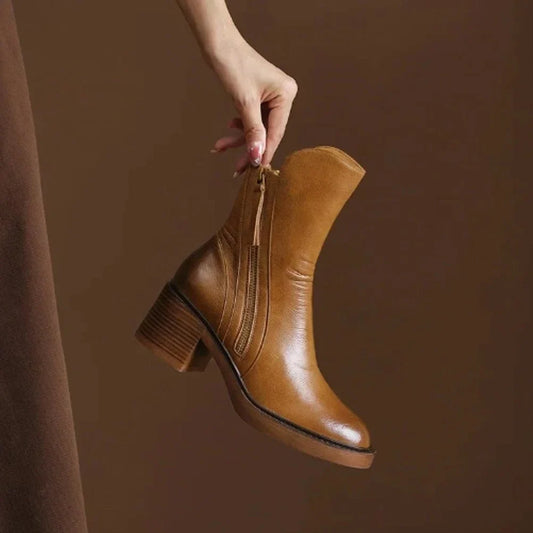 Women's leather ankle boots with side zip and platform sole