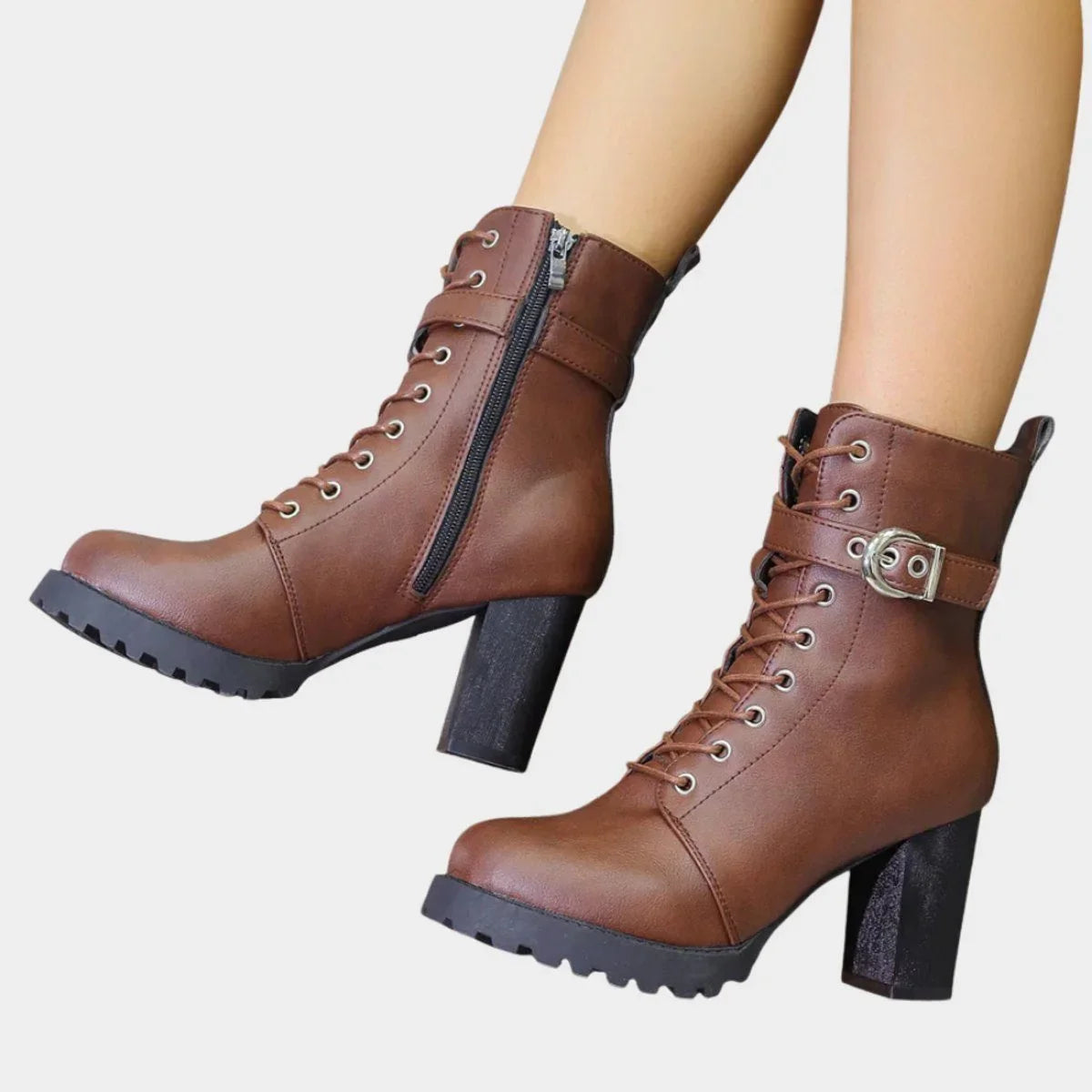Women's faux leather combat ankle boots with lace-up and buckle