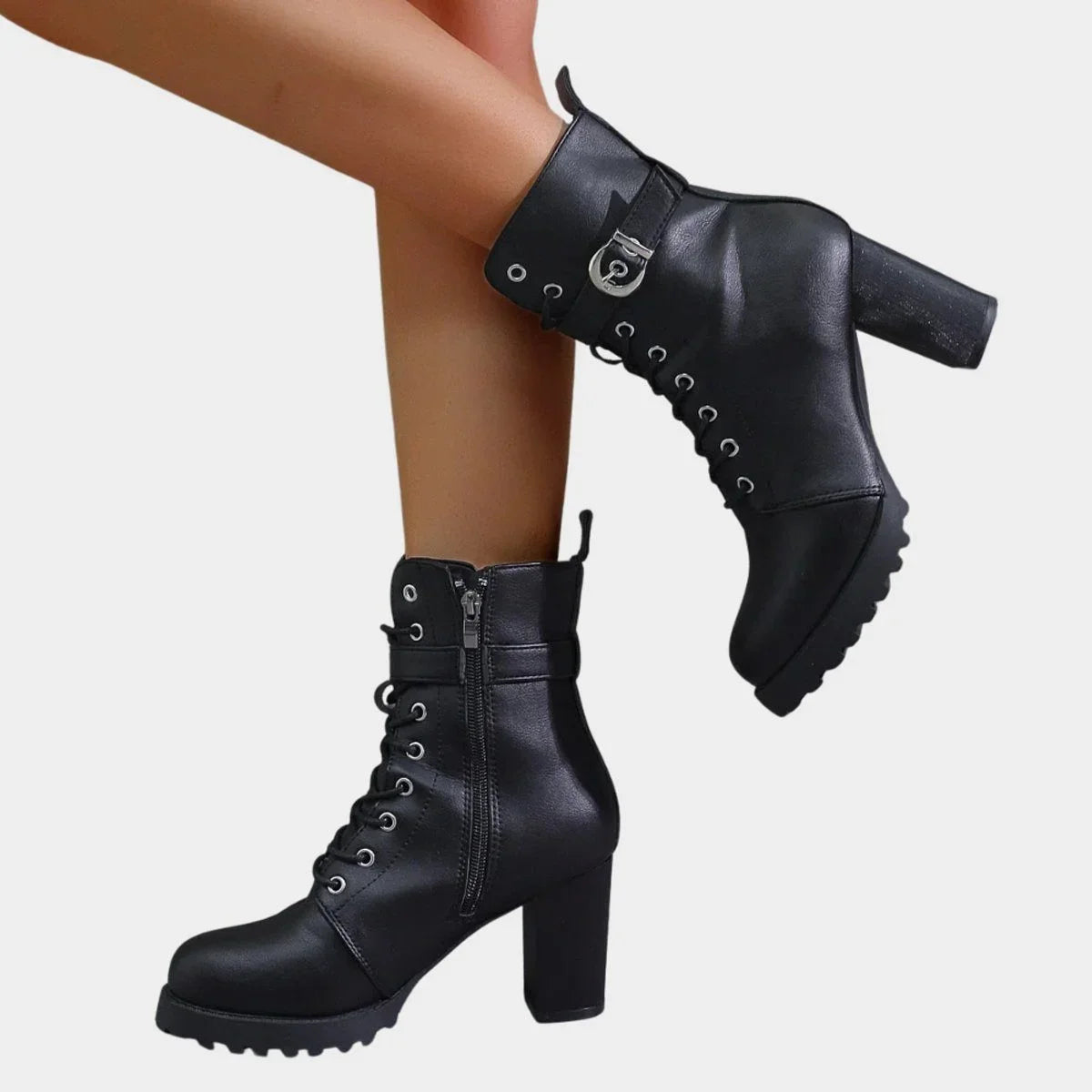 Women's faux leather combat ankle boots with lace-up and buckle