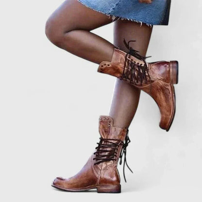 Women's leather knee-high boots with lace-up and studded cuff