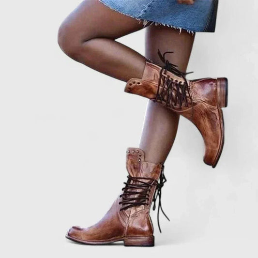 Women's leather knee-high boots with lace-up and studded cuff