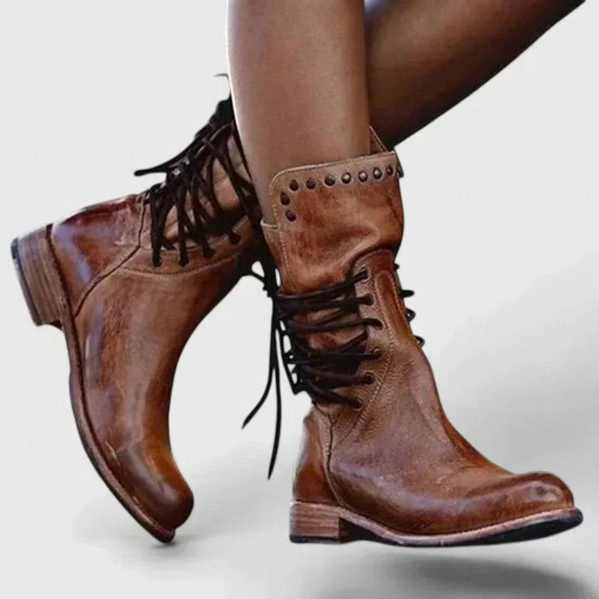 Women's leather knee-high boots with lace-up and studded cuff