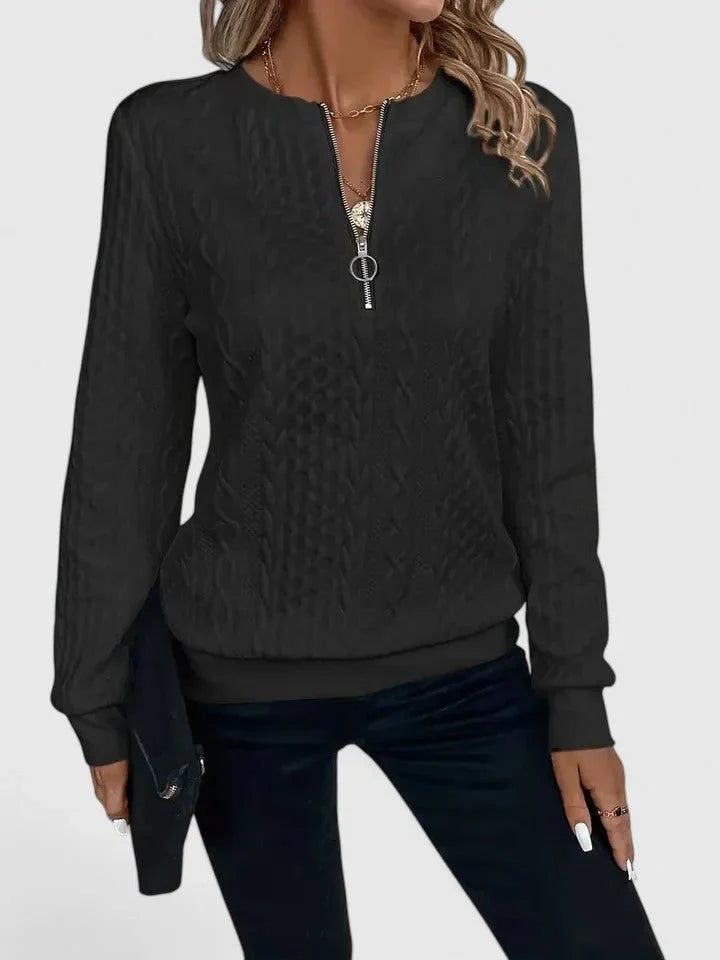 Women's cable knit pullover sweater with V-neckline detail