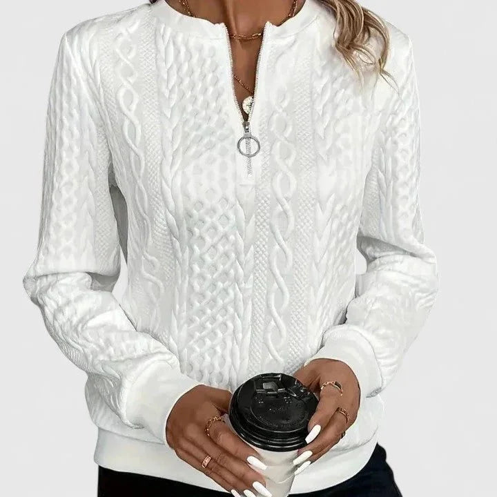 Women's cable knit pullover sweater with V-neckline detail