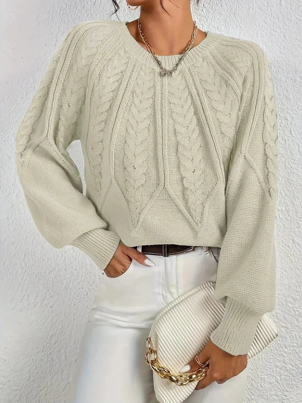 Women's cable knit crew neck sweater with cropped fit