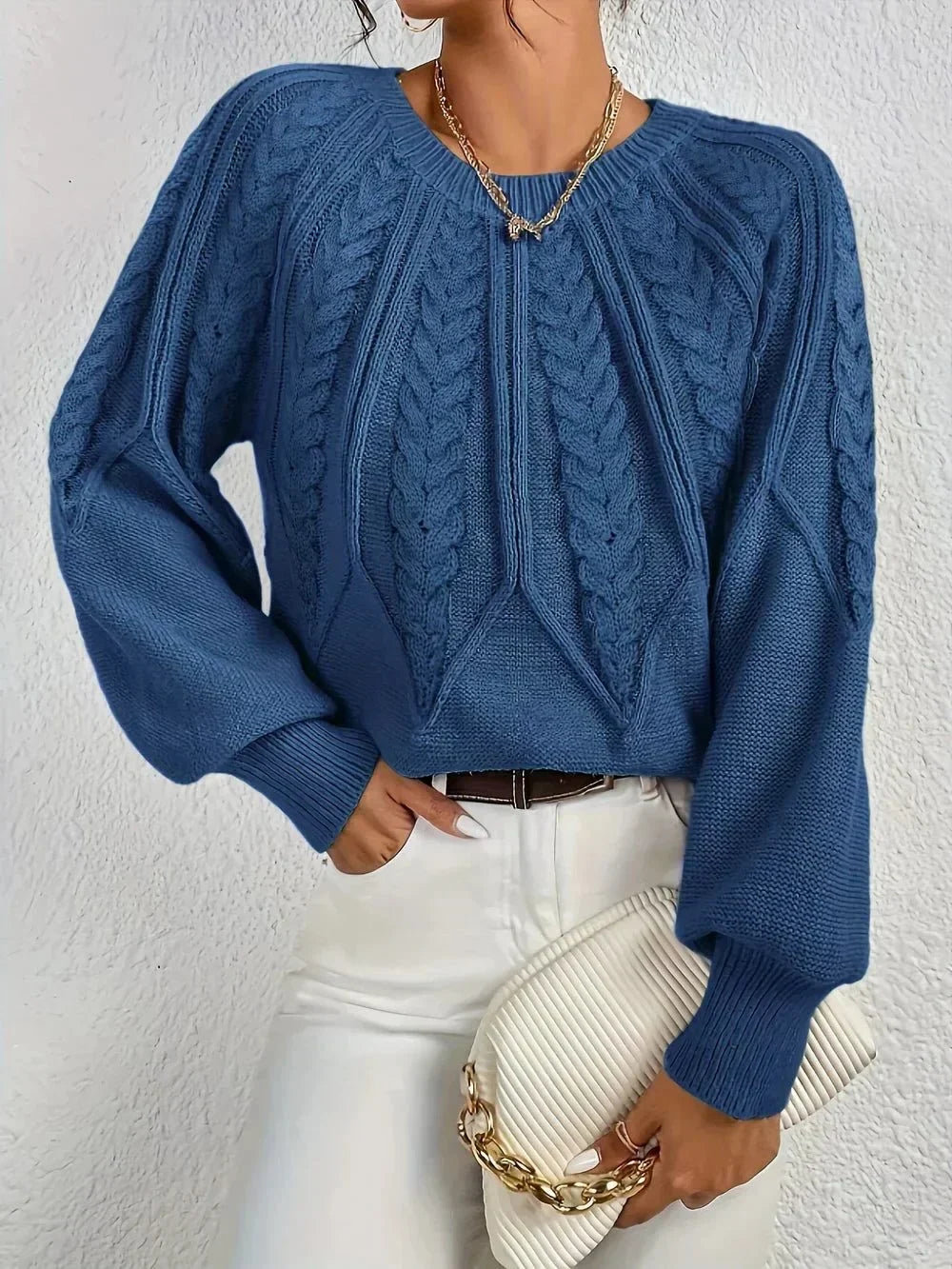 Women's cable knit crew neck sweater with cropped fit