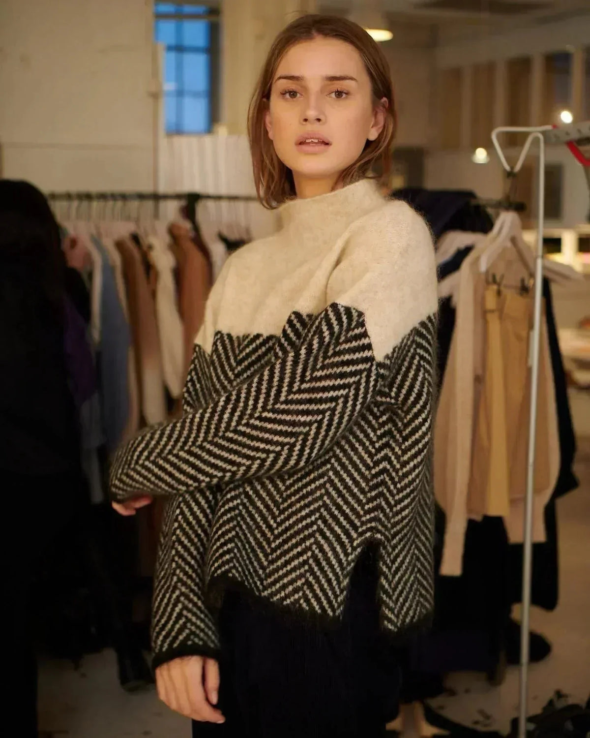 Women's chevron knit roll neck sweater with contrast pattern