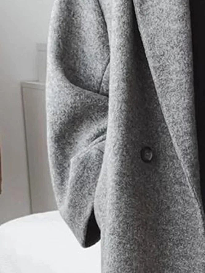 Women's tailored overcoat with versatile styling