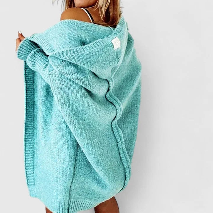 Women's oversized hooded knit cardigan with knee-length hem