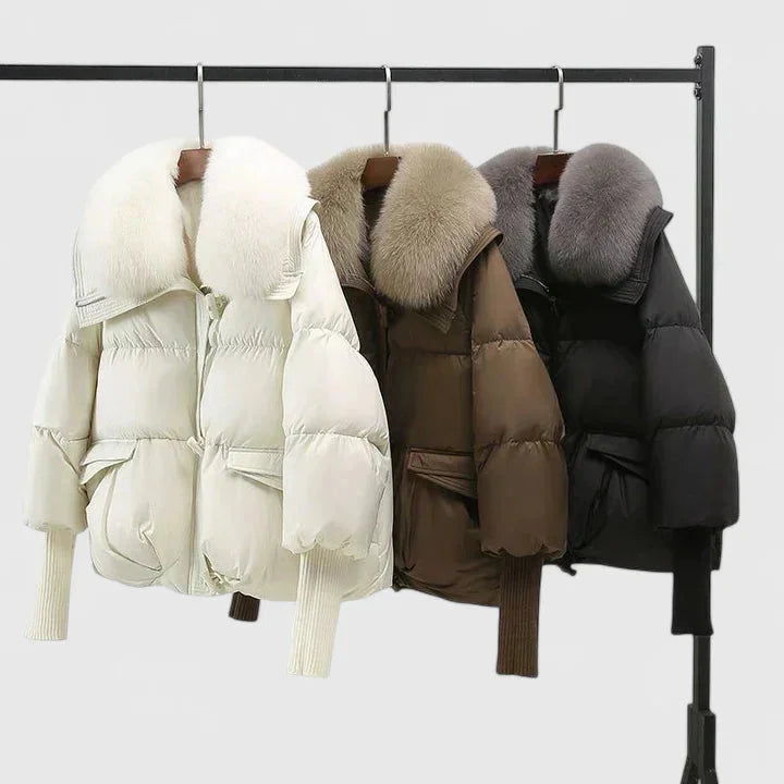 Women's quilted toggle collared puffer jacket with faux fur