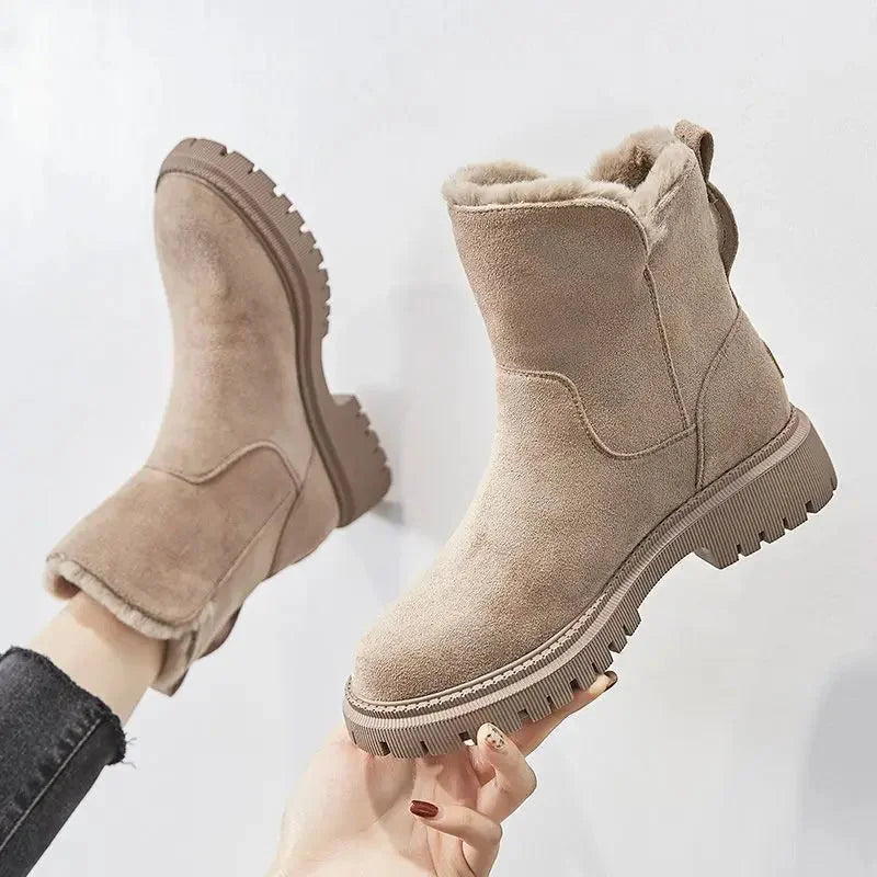Women's faux-fur lined winter boots with suede-inspired finish