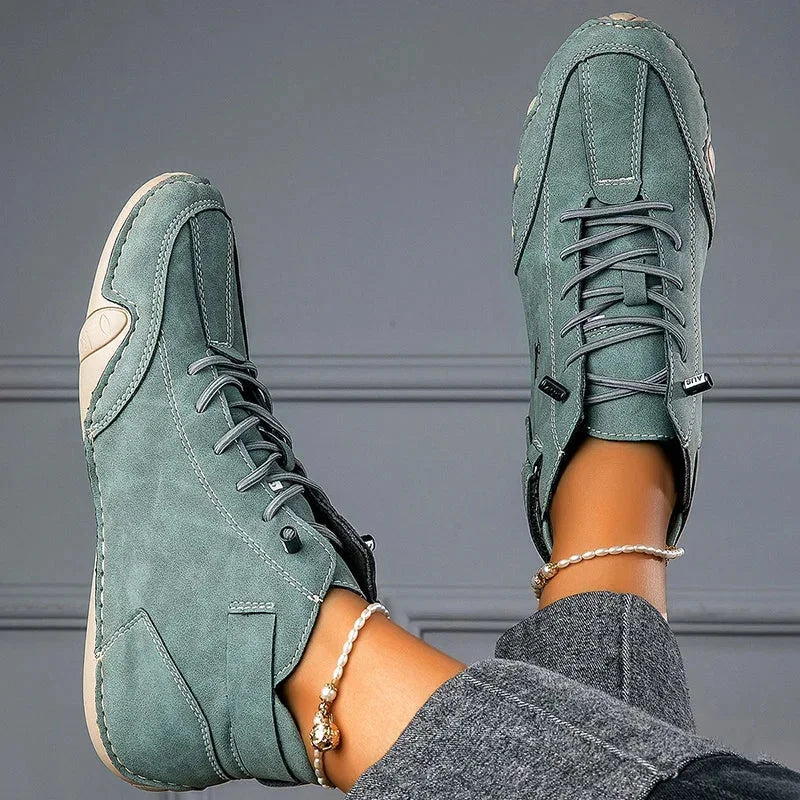 Women's suede lace-up ankle boots with wavy rubber sole