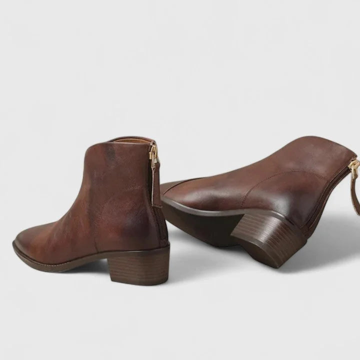 Women's faux leather side zip ankle boots with V-cut topline