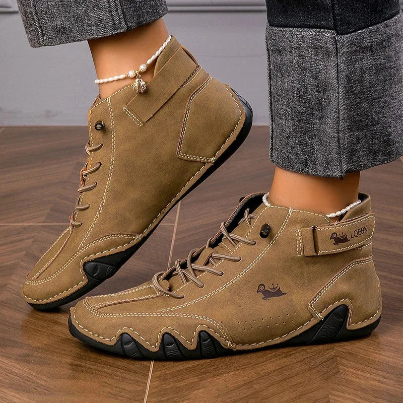 Women's suede lace-up ankle boots with wavy rubber sole