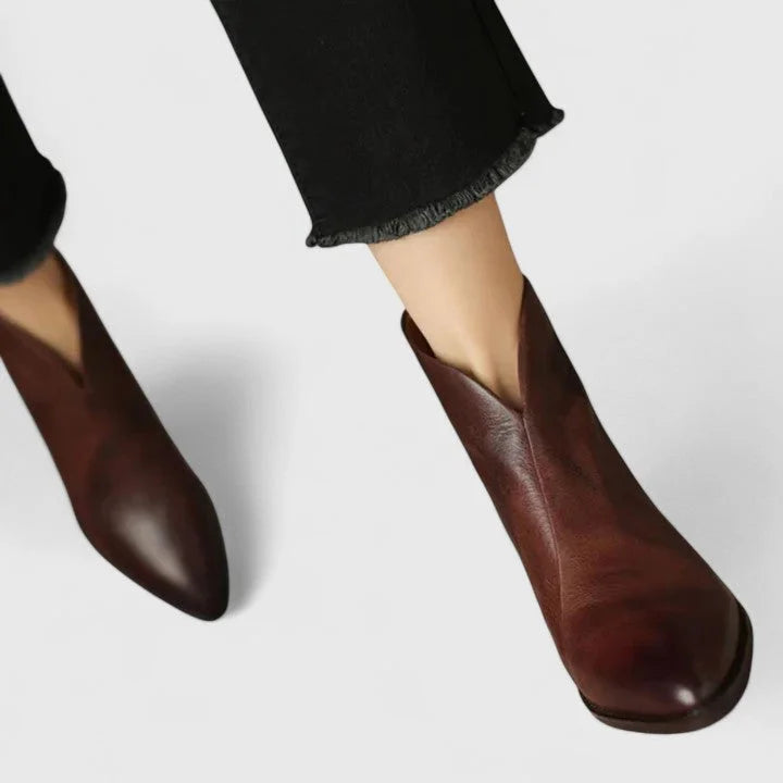 Women's faux leather side zip ankle boots with V-cut topline