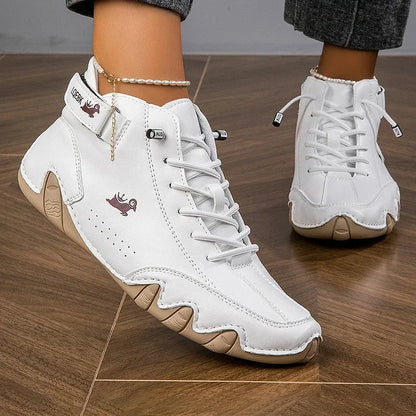 Women's suede lace-up ankle boots with wavy rubber sole