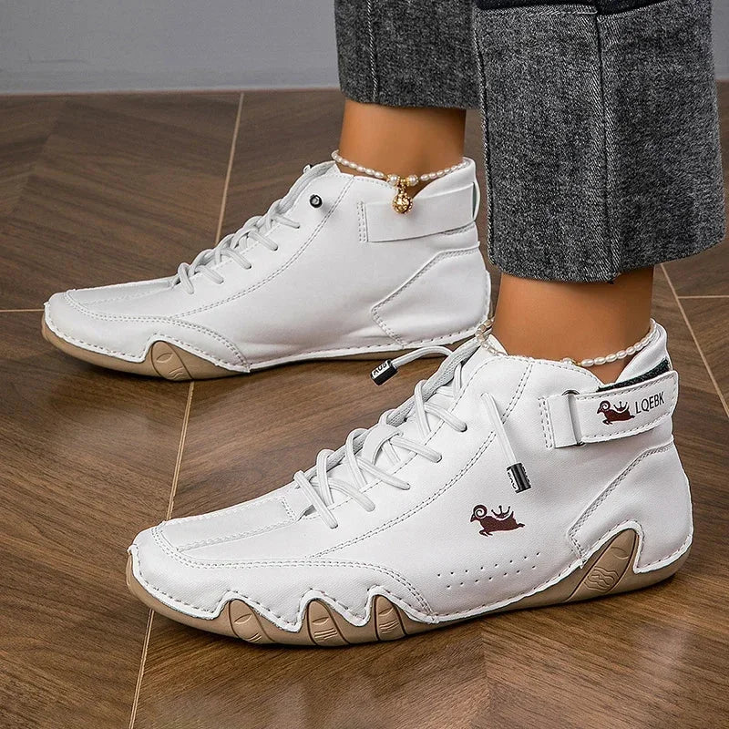 Women's suede lace-up ankle boots with wavy rubber sole