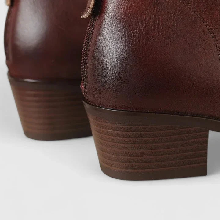 Women's faux leather side zip ankle boots with V-cut topline