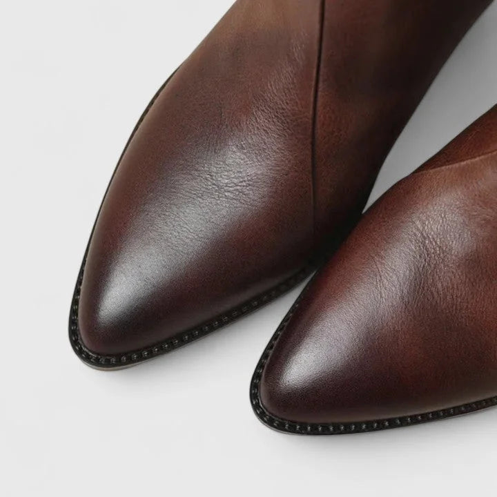 Women's faux leather side zip ankle boots with V-cut topline