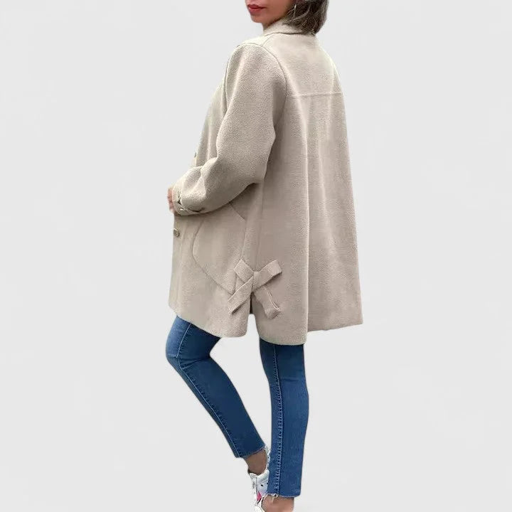Women's button-front collared wool coat with bow details on back