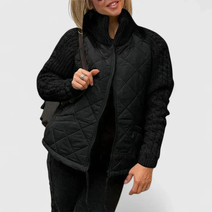 Women's zip-up stand collar quilted jacket with knit sleeves – Black