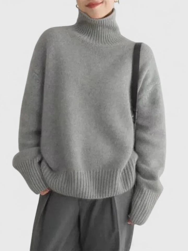 Women's knit roll neck jumper with ribbed cuffs and hem