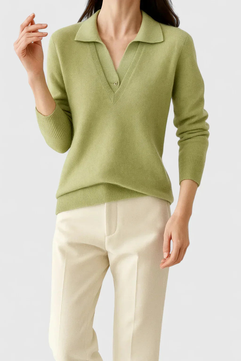 Women's knit V-neck jumper with button detail on cuffs