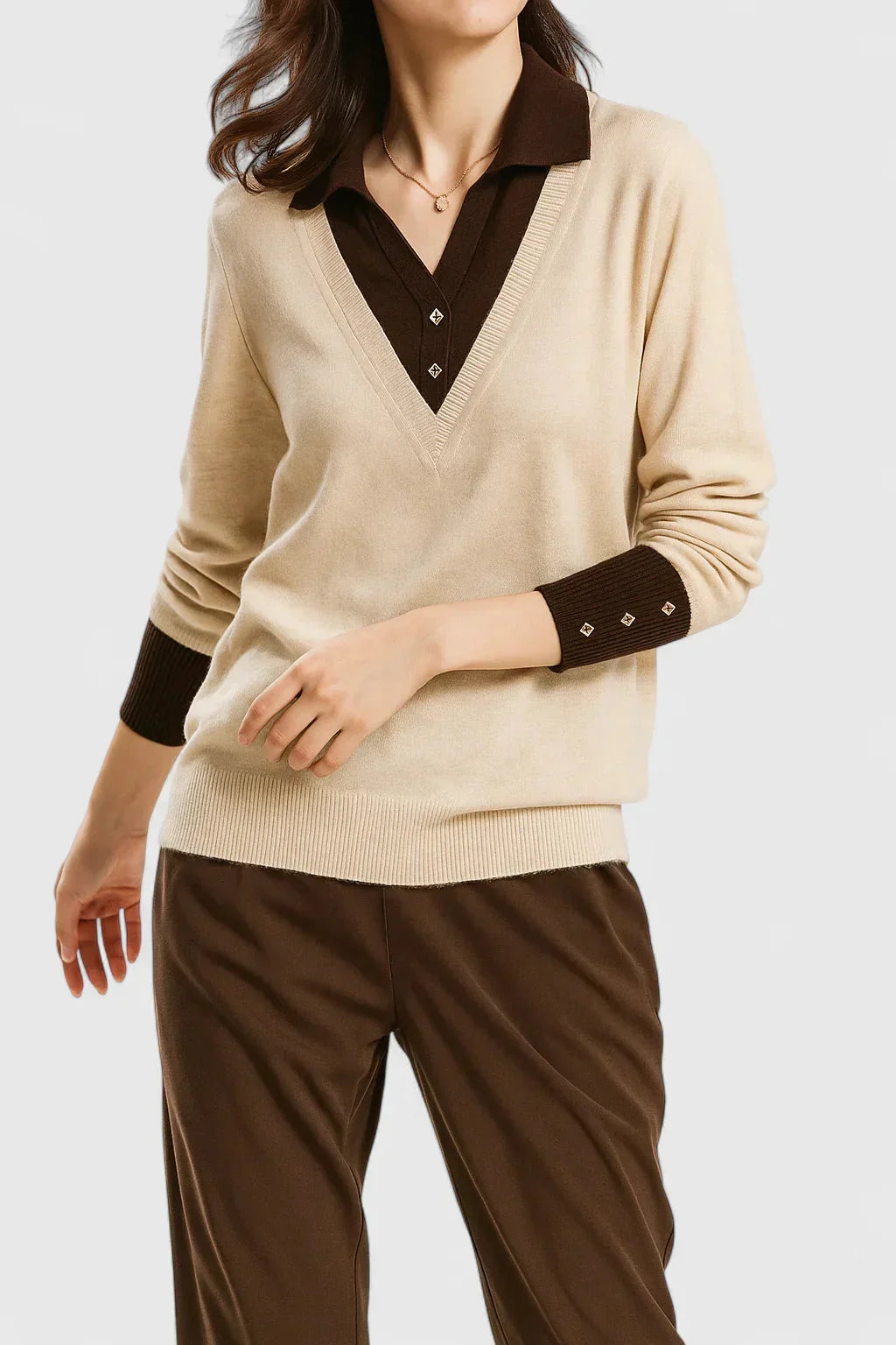 Women's knit V-neck jumper with button detail on cuffs