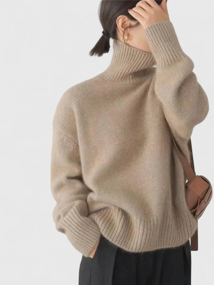 Women's knit roll neck jumper with ribbed cuffs and hem