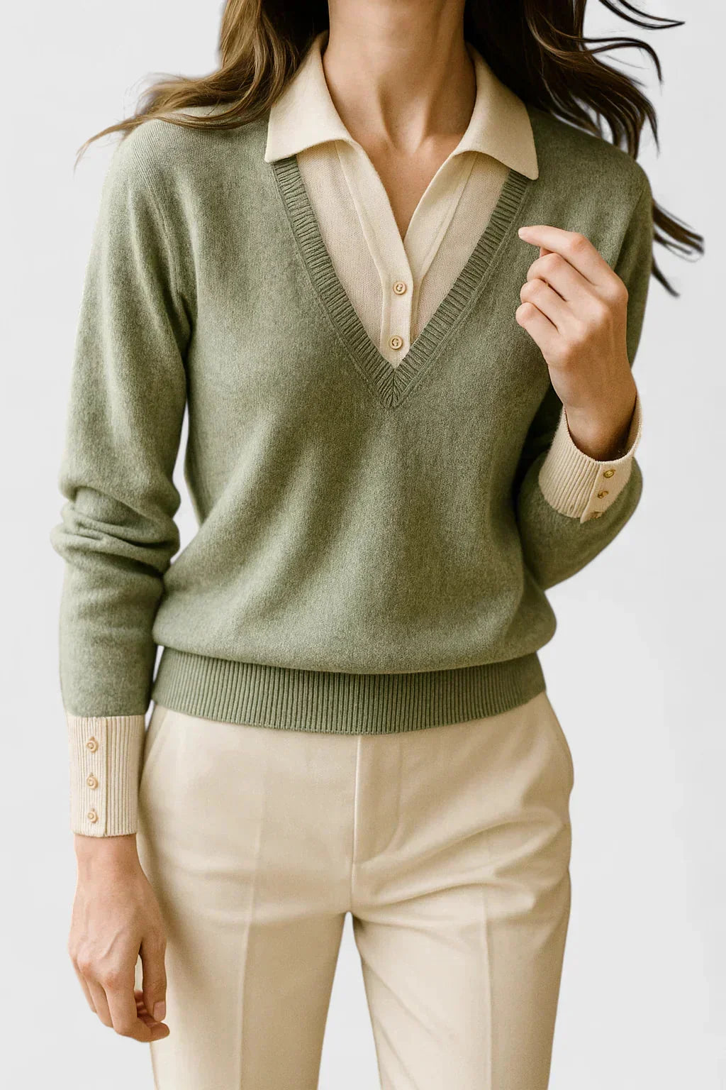Women's knit V-neck jumper with button detail on cuffs