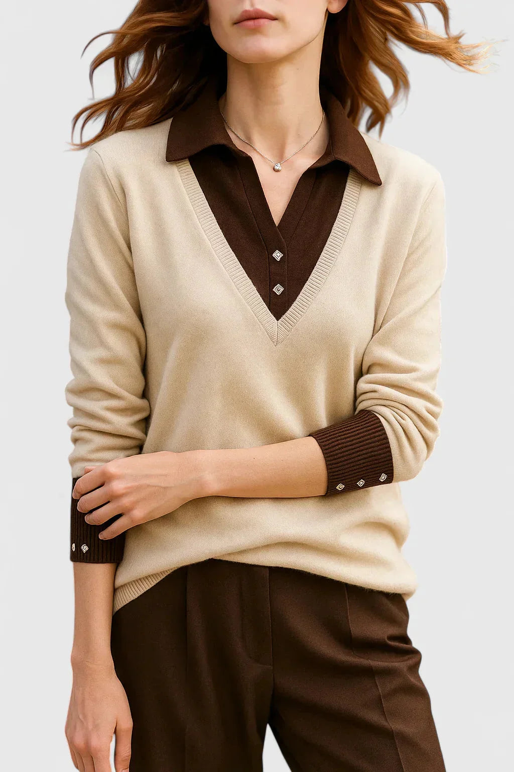 Women's knit V-neck jumper with button detail on cuffs