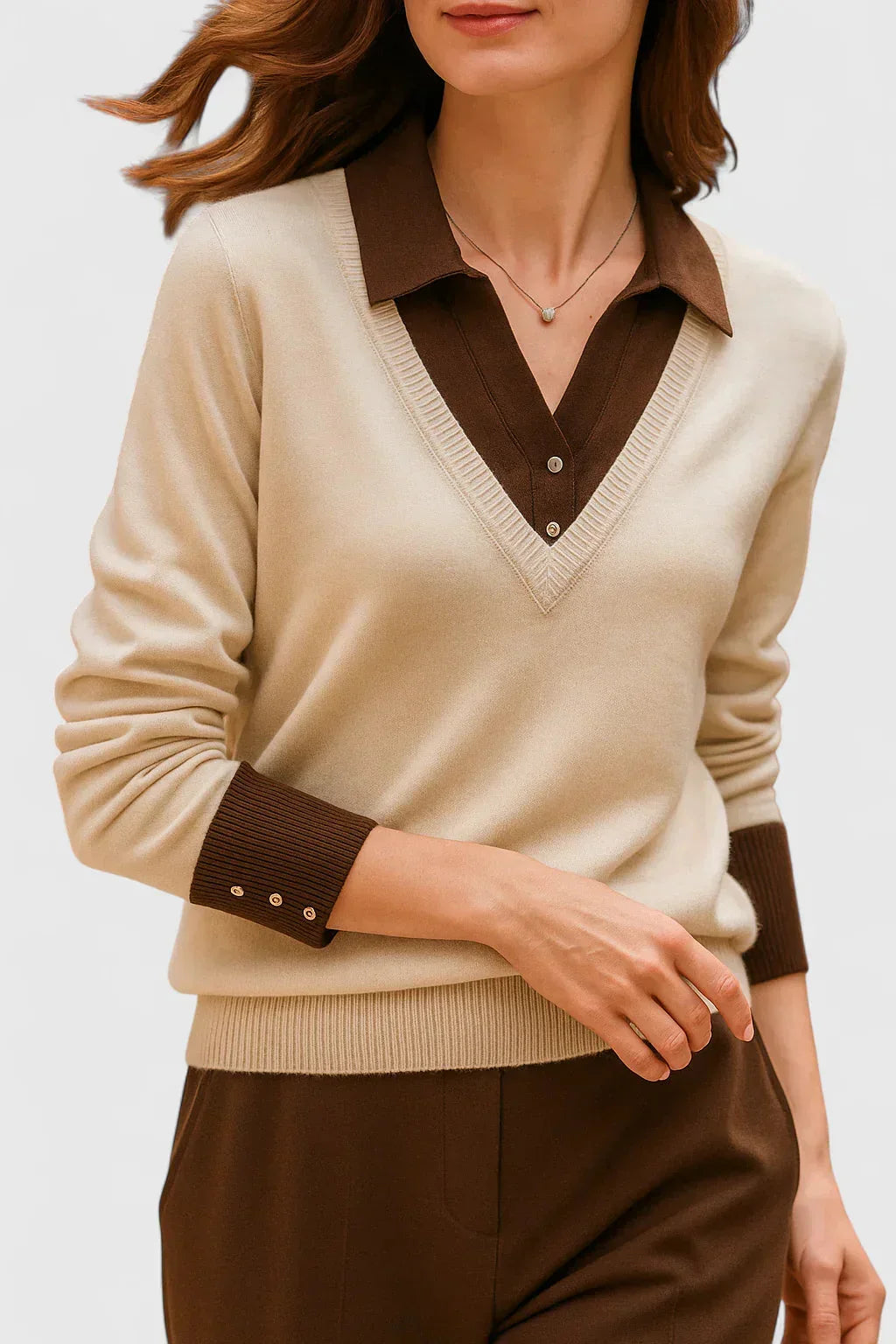 Women's knit V-neck jumper with button detail on cuffs