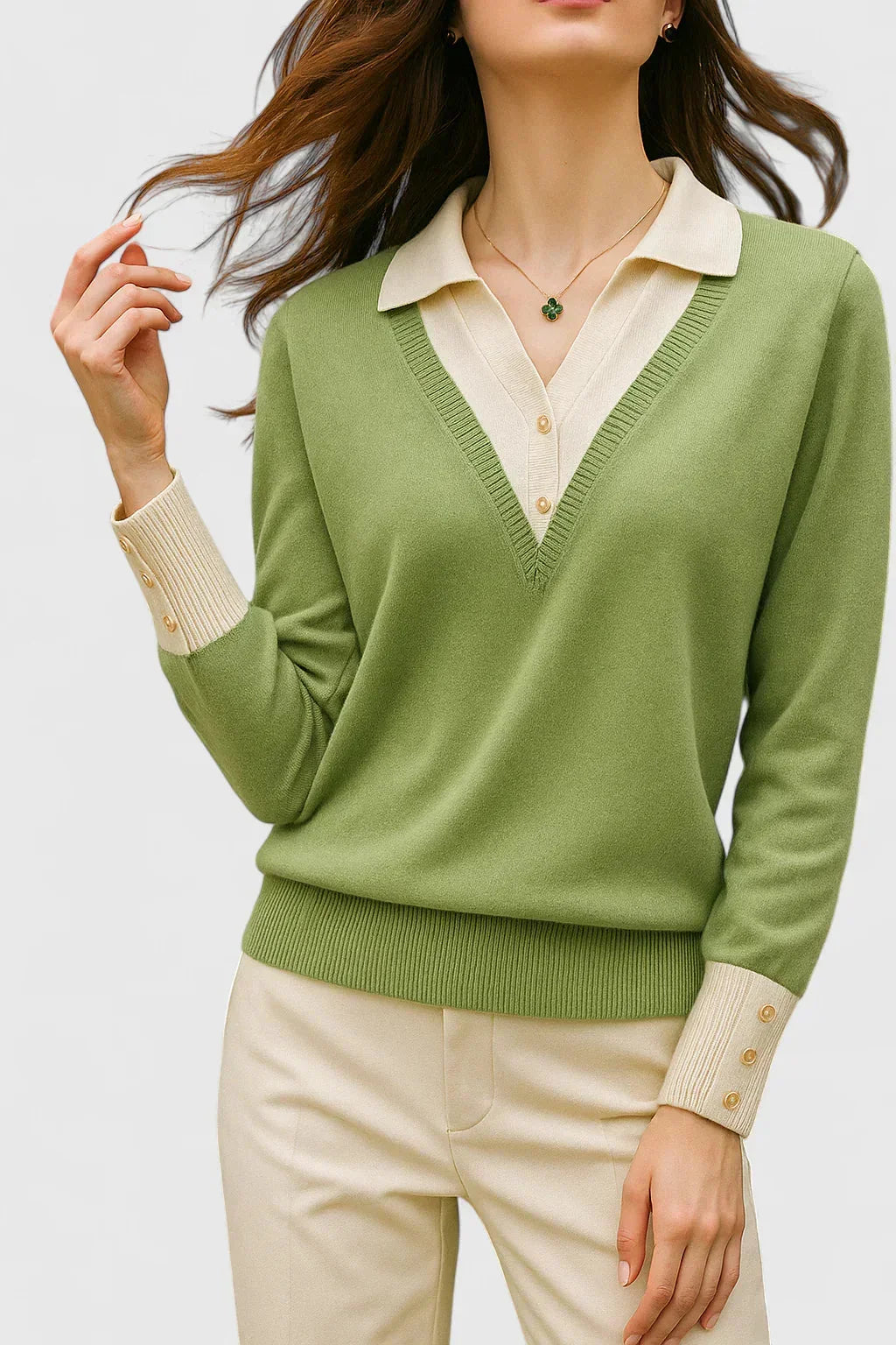 Women's knit V-neck jumper with button detail on cuffs