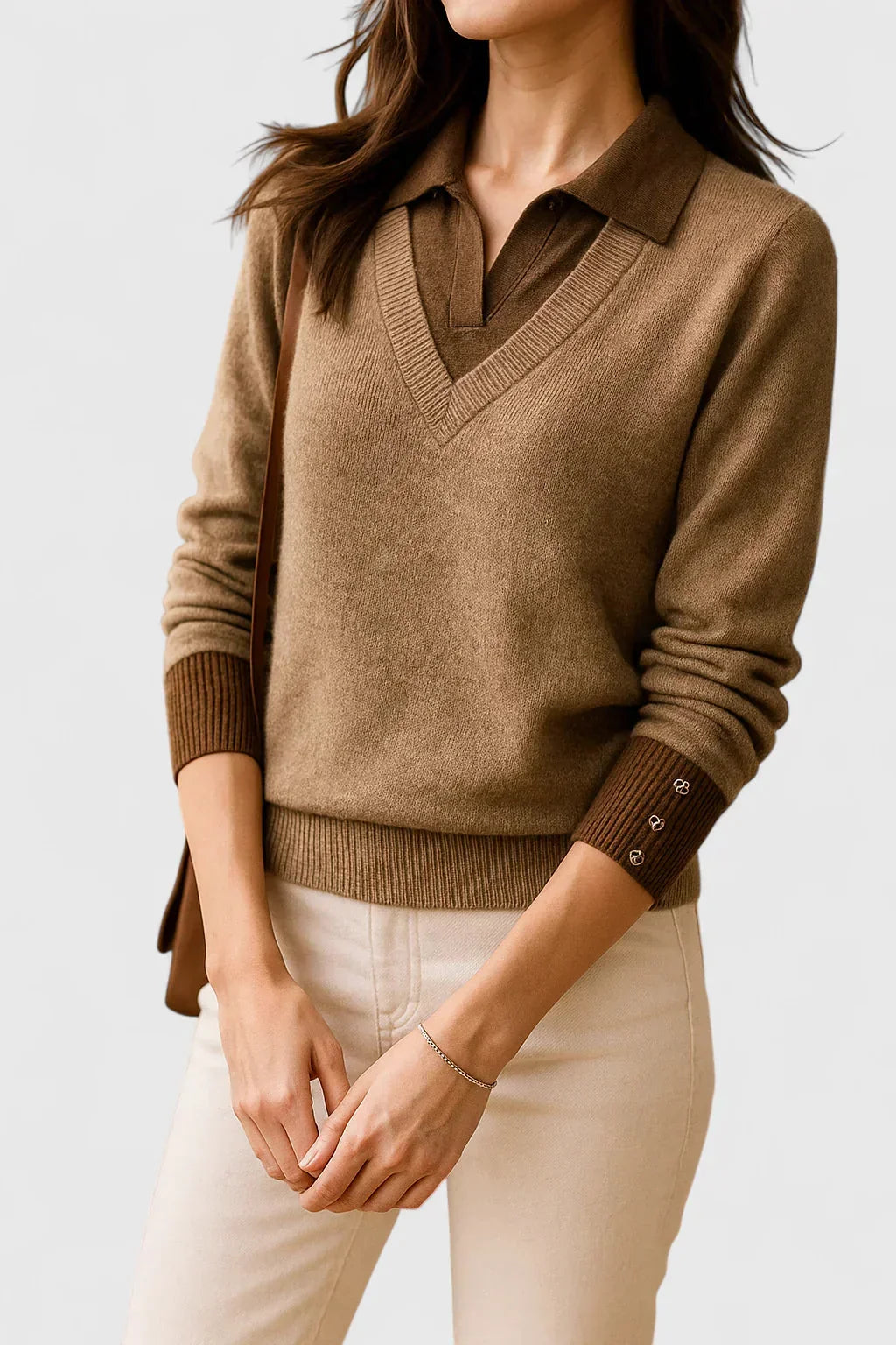 Women's knit V-neck jumper with button detail on cuffs