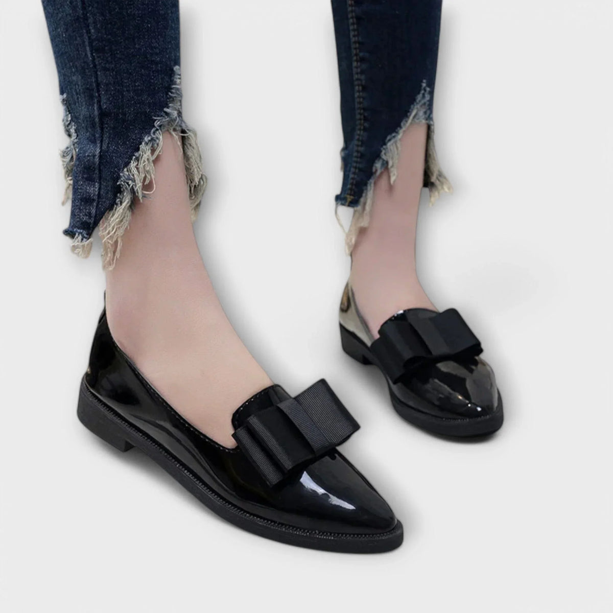 Women's faux leather loafers with bow detail