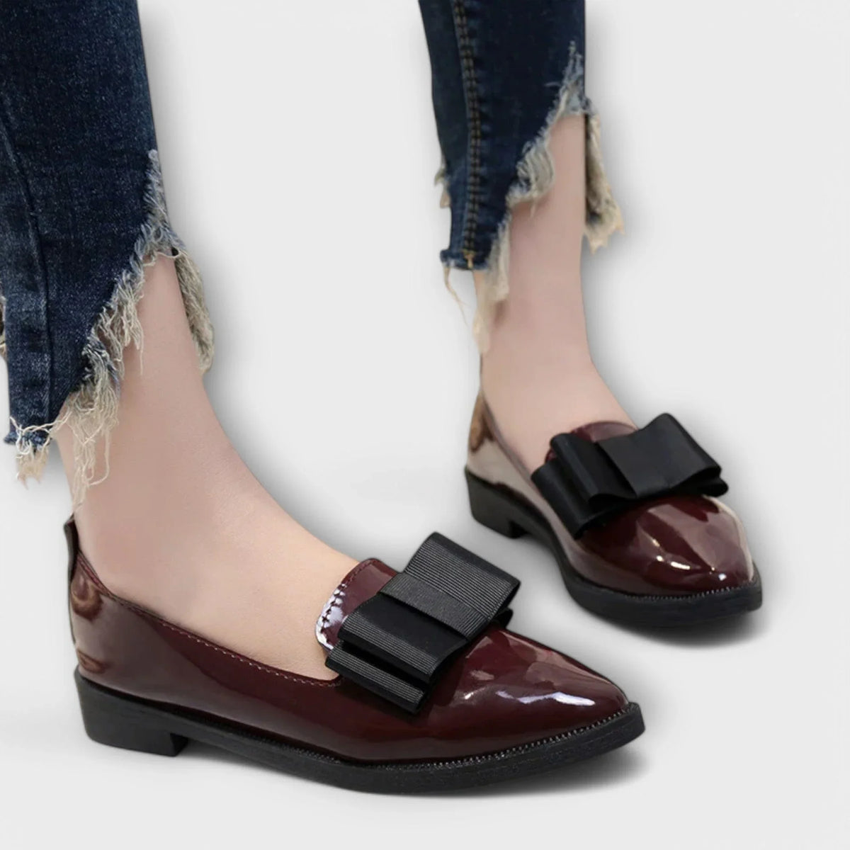 Women's faux leather loafers with bow detail
