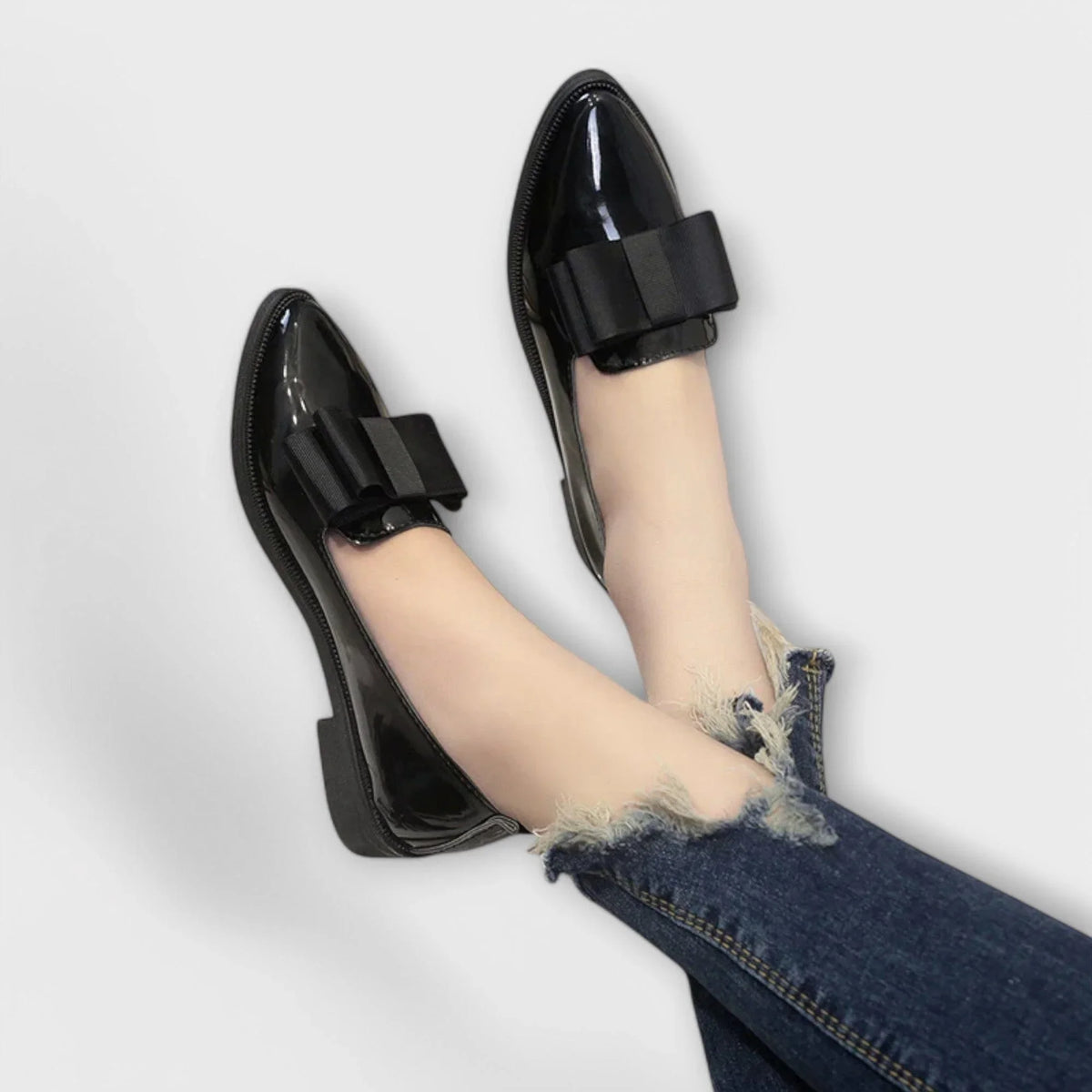 Women's faux leather loafers with bow detail